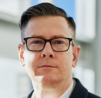 Alexander Hughes, PDG à la tête d’une société de trading crypto, en portrait